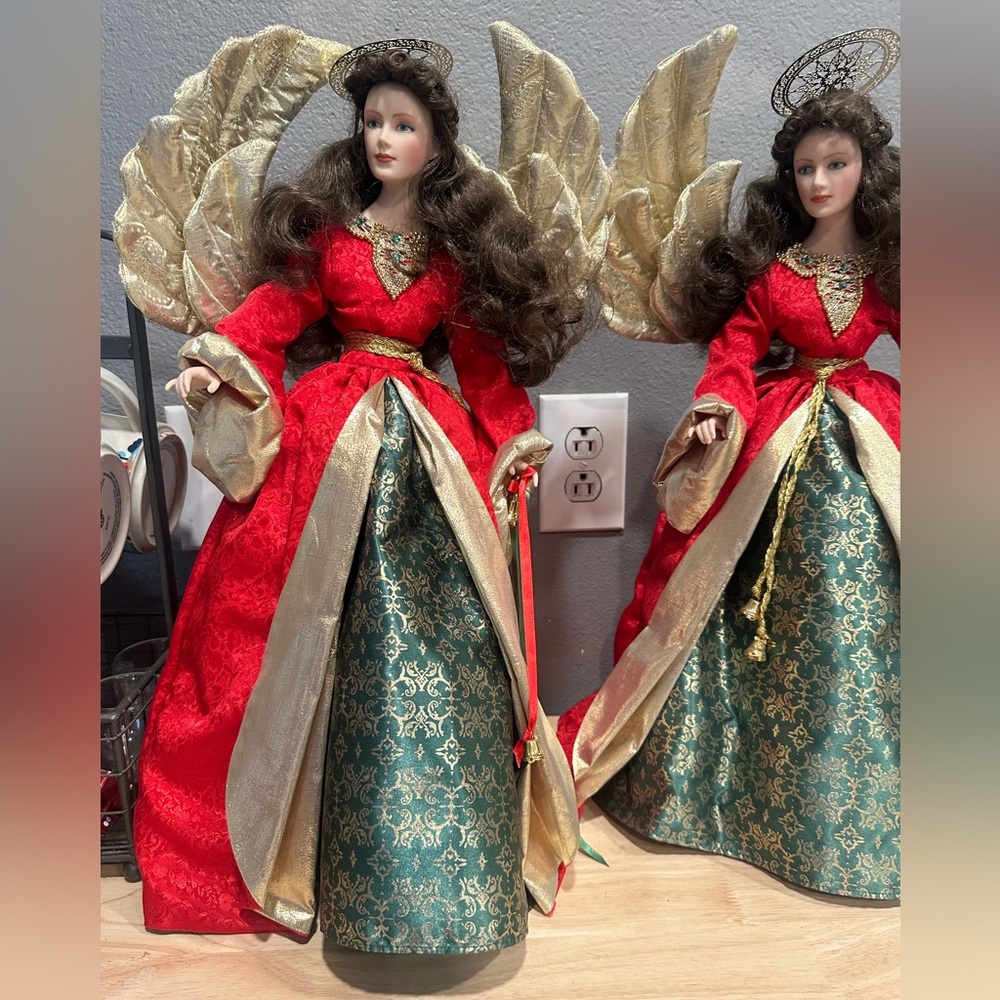Pair of Franklin Mint| Holiday| 991 | 19” tall w/ stand 
Porcelain Dolls